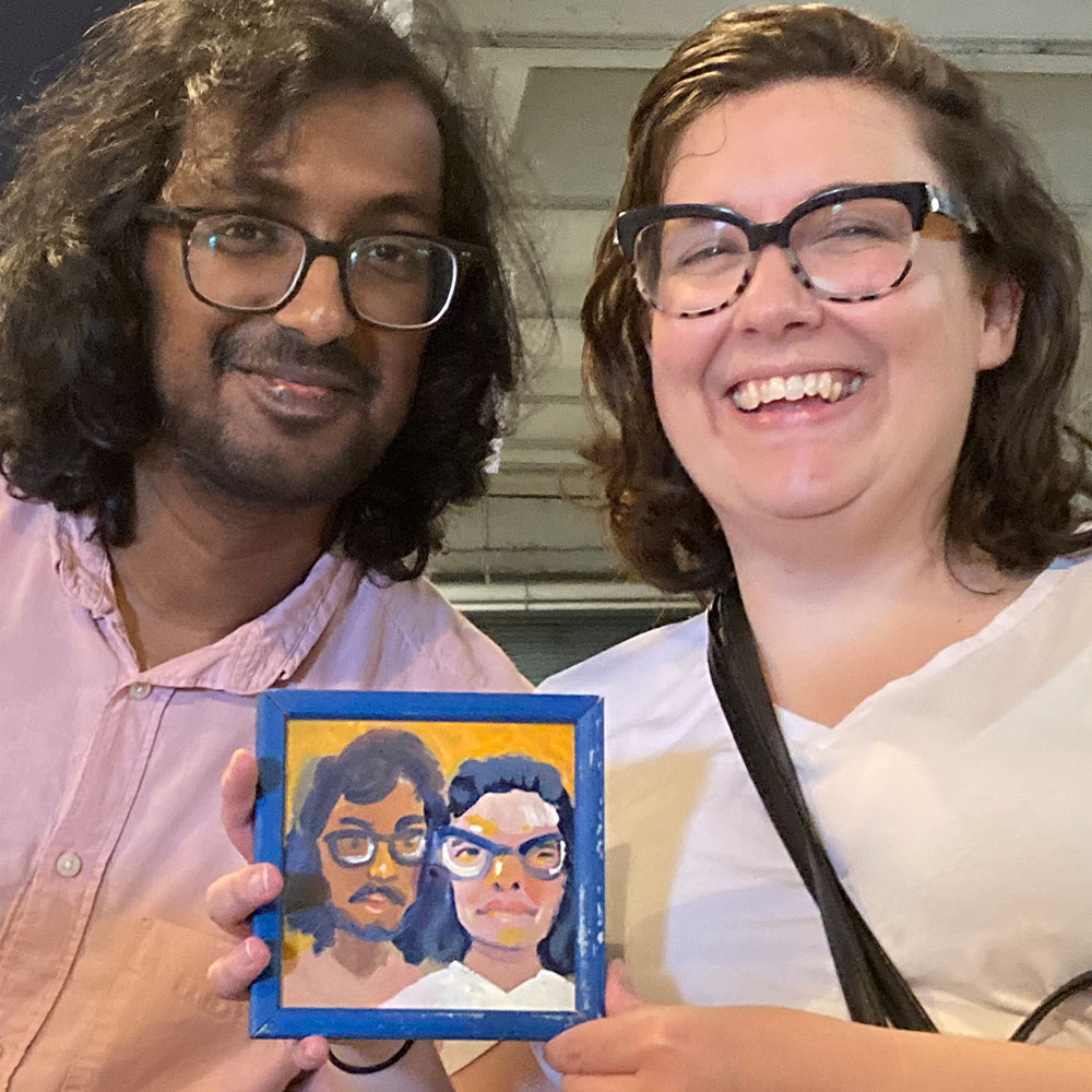 Photo of people smiling with their portrait