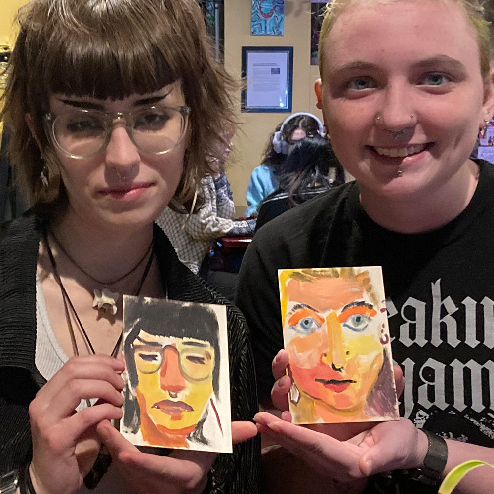 Photo of people smiling with their portrait